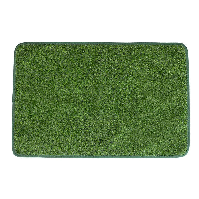 Green washable dog grass pee pad on a patio for pet potty training