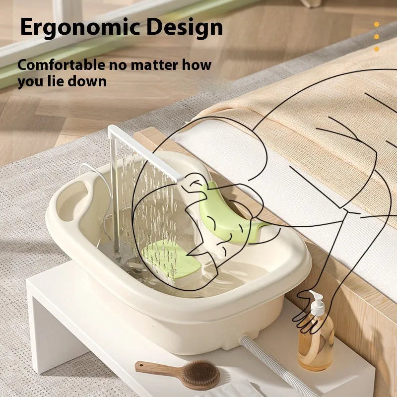Portable bed shampoo basin with integrated neck pillow, circulating water pump, drain pipe, and massage brush for hair washing while lying down