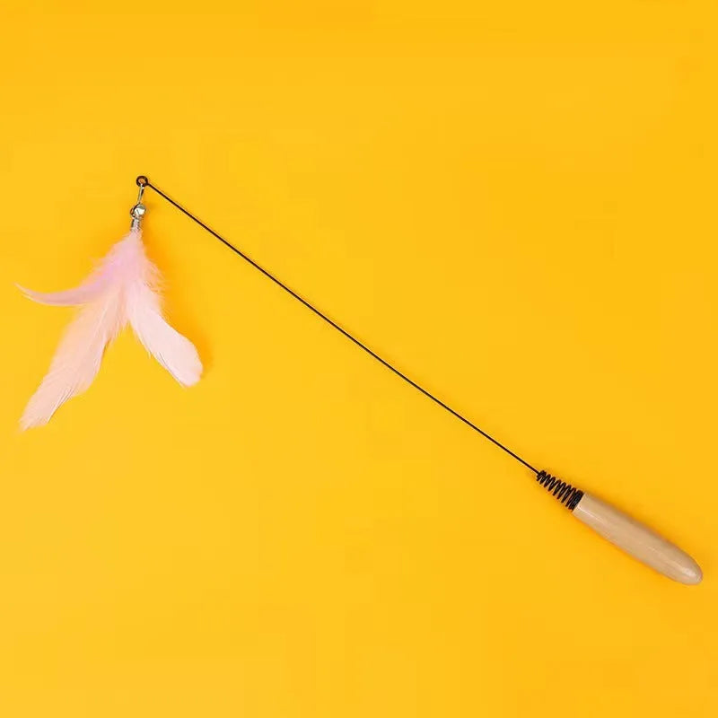 Cat teasing stick with wooden handle, flexible metal spring, and feather bell replacement head