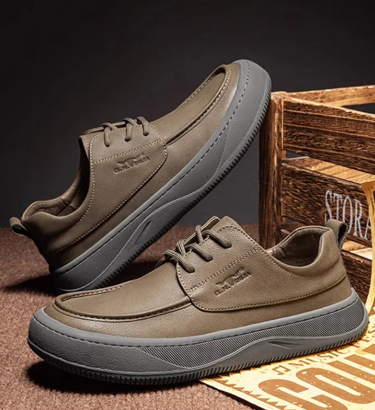 Brown retro leather casual shoes with big toe design and visible stitching on a rubber sole.