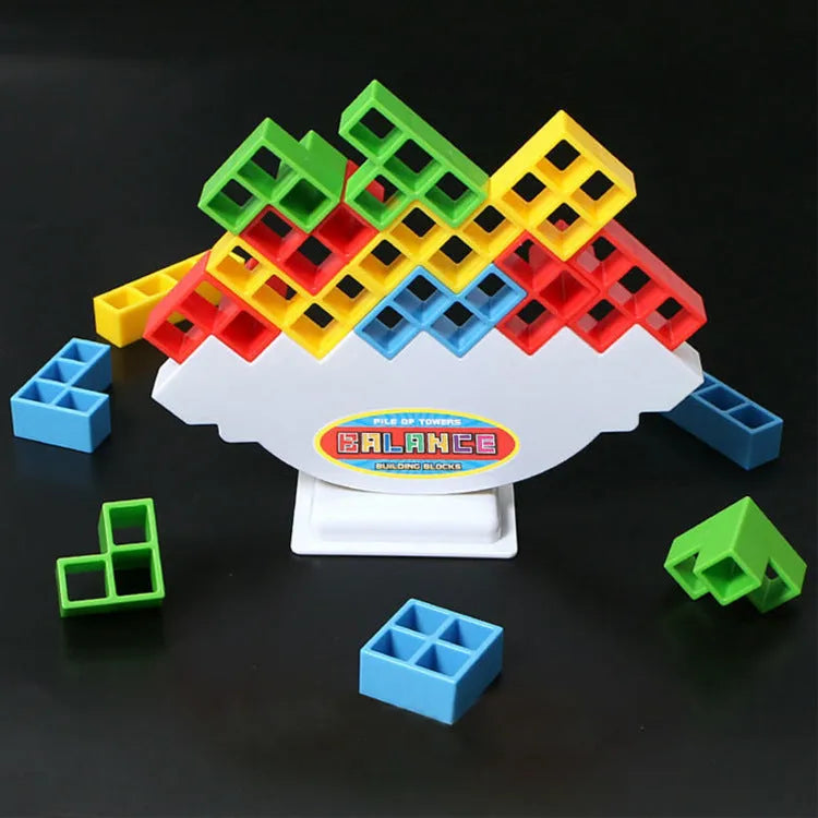 Plastic balance stacking game with 16 coloured blocks on 26.5cm square chassis for family play