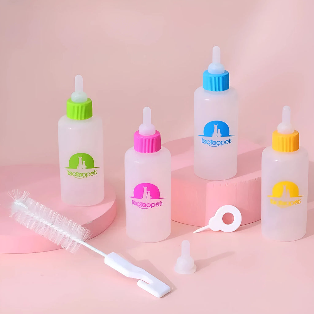 Four coloured pet milk bottle feeders with cleaning brush for newborn puppies and kittens