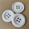 Oversized round plastic nylon buttons with 4 holes in various colours and sizes from 38mm to 70mm diameter