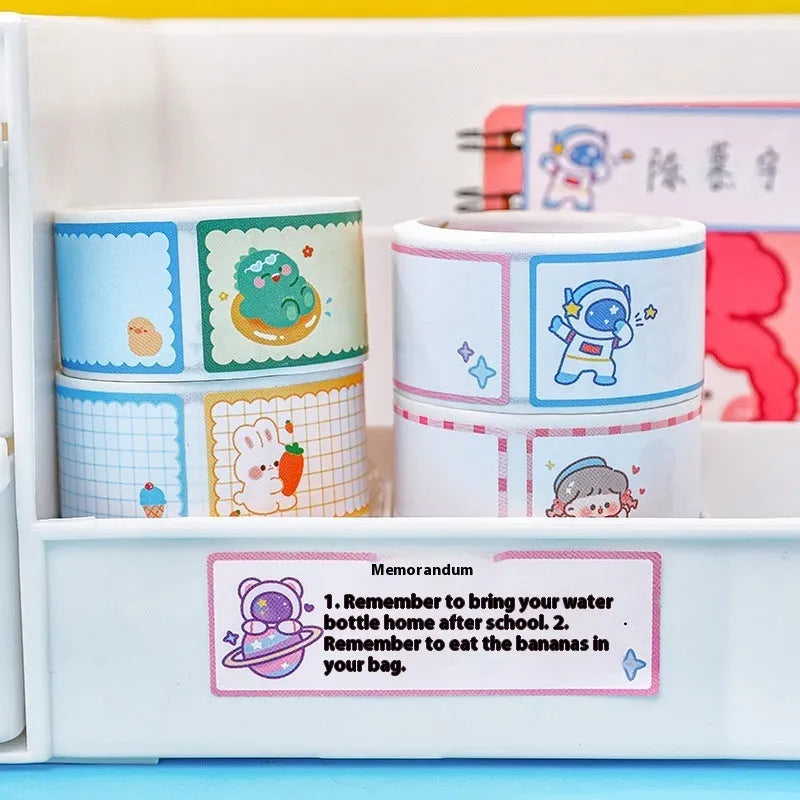 Roll of student cartoon name tape stickers with dinosaur, astronaut, rabbit, and girl designs for labelling school items