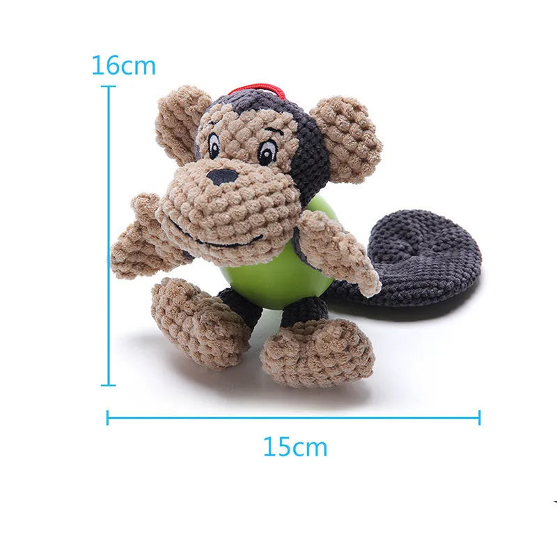 Red and tan plush monkey dog toy with squeaker, shown with a small dog.