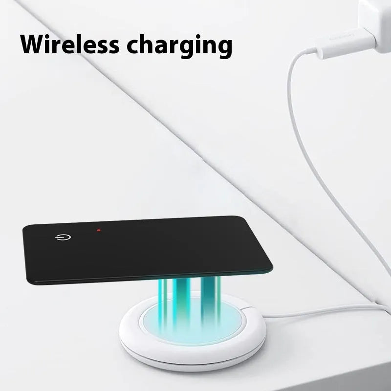 Black credit card sized pet tracker with a hanging hole, showing wireless charging and NFC symbols.