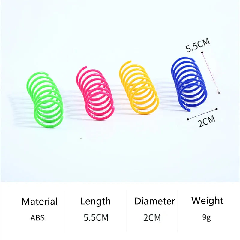 Colourful plastic coil spring cat toys shown in a mixed group, each measuring 5.5 cm long.