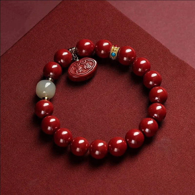 Cinnabar bracelet with Emperor Sandstone style and Ping An Fu Lu design in 8mm or 10mm bead size