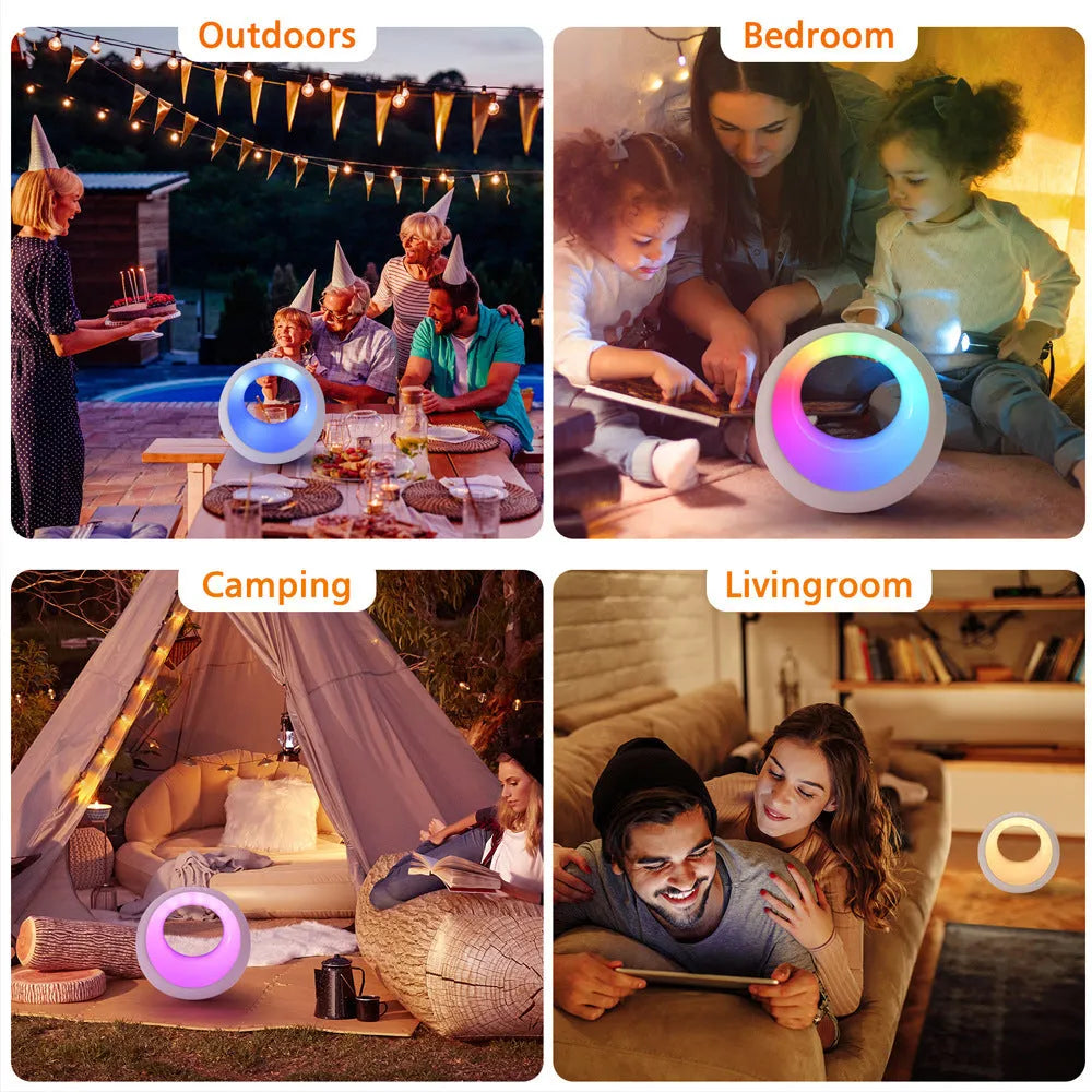 Small RGB colour changing night lamp with remote control on wooden desk