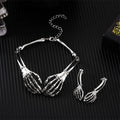 Dark style skull and ghost hand jewellery set with matching necklace and earrings in electroplated alloy