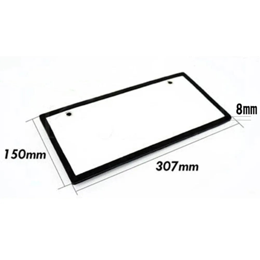 A pair of black plastic LED licence plate light bars for trucks on a white background.