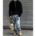 Solid colour loose fit long sleeve pullover top shown in grey, black, or apricot.