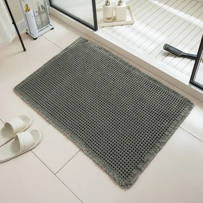 Square checkered pattern bathroom carpet with non-slip backing in beige colour, 61x92cm size