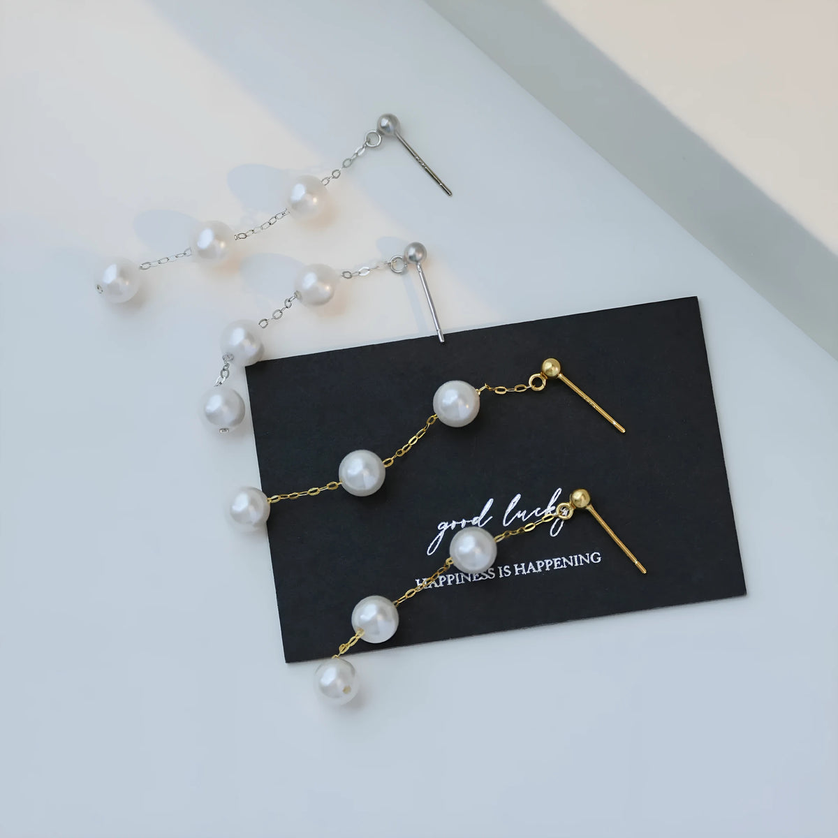 Long star fringe earrings for women in 925 silver with gold or white gold electroplated finish and U-shaped design