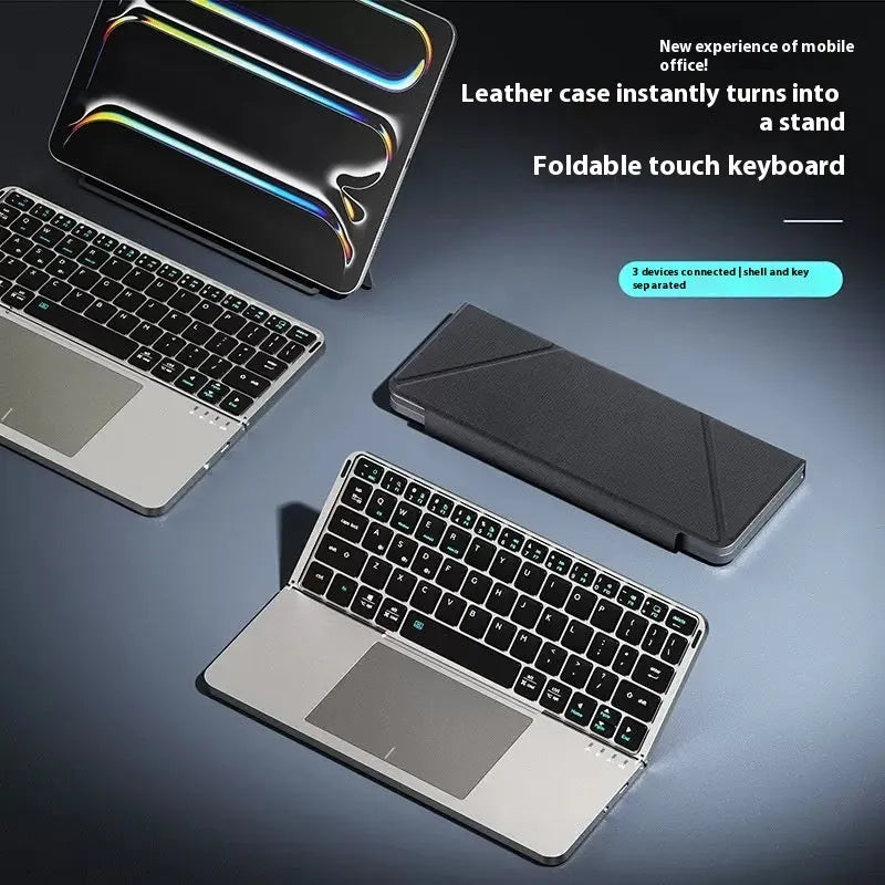 Grey folding Bluetooth keyboard unfolded next to mobile phone showing 60-key layout and compact design