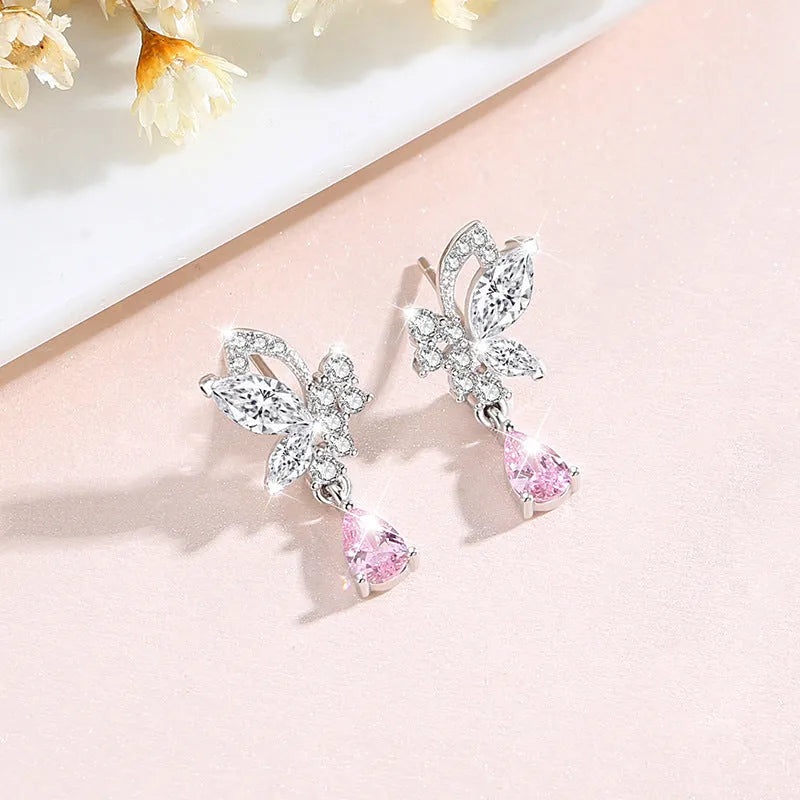 Butterfly design silver stud earrings with crystal accents on 925 silver backing for women