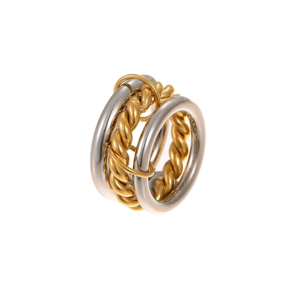 Stacked stainless steel rings with 18K gold plating in three colour variations, showing adjustable free size design