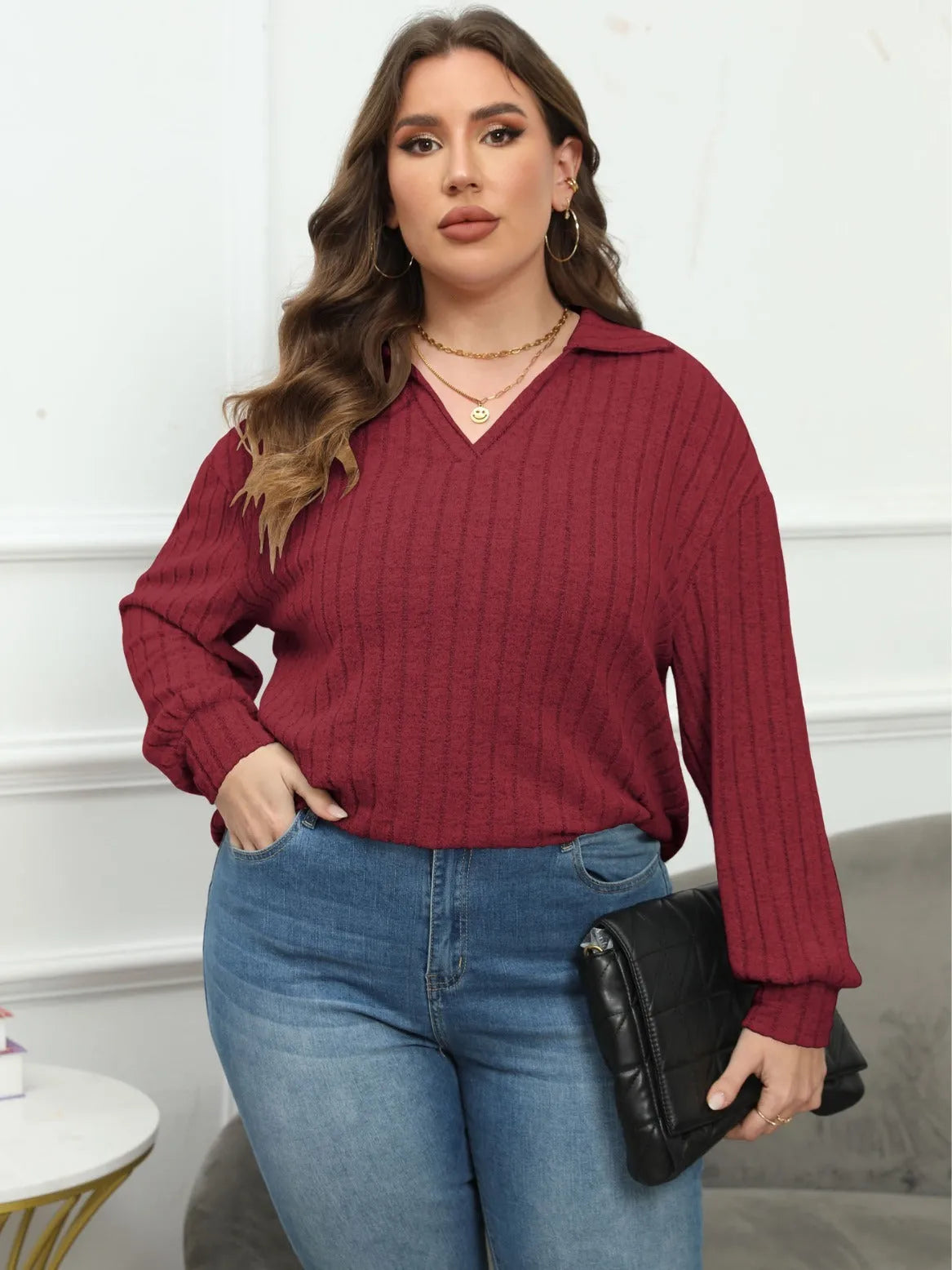 Women's plus size gray polo collar shirt with lantern sleeves and collage stitching details on polar fleece fabric
