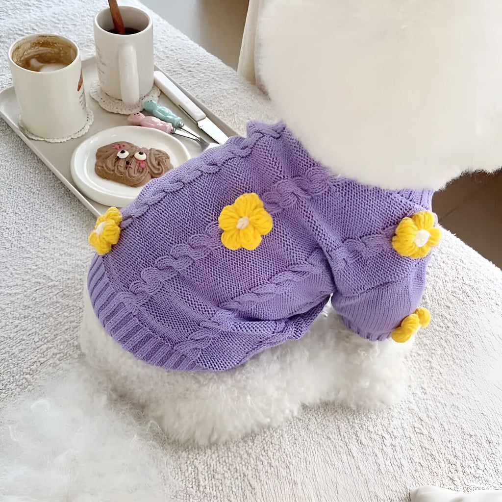 Purple knitted dog clothing with floral pattern showing size options for small pets