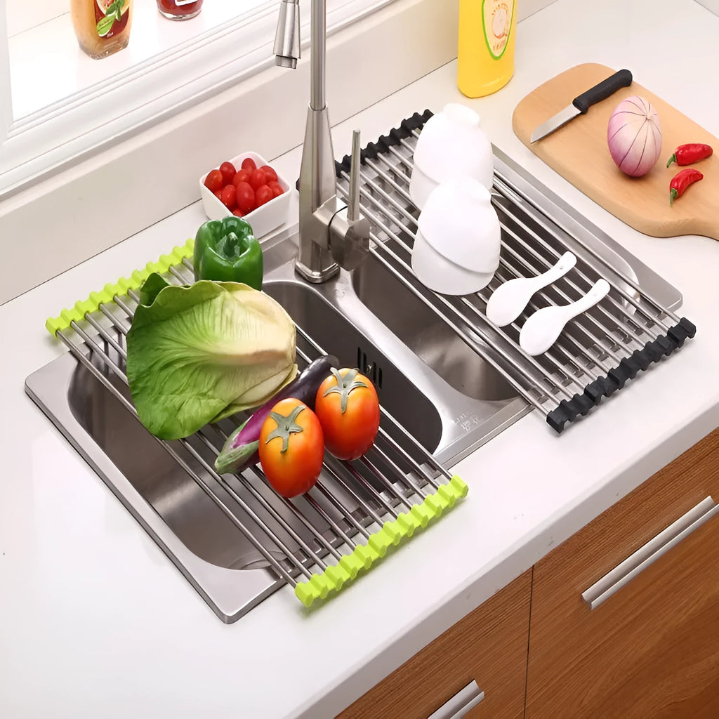 Folding stainless steel dish drainer rack in blue, shown over a kitchen sink