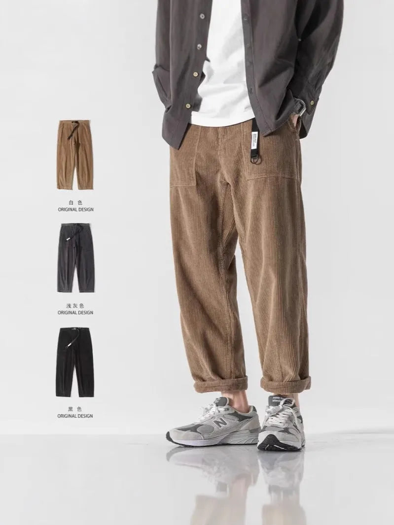 Loose straight tapered pants in dark grey, black, or khaki with wide legs and straight-leg opening