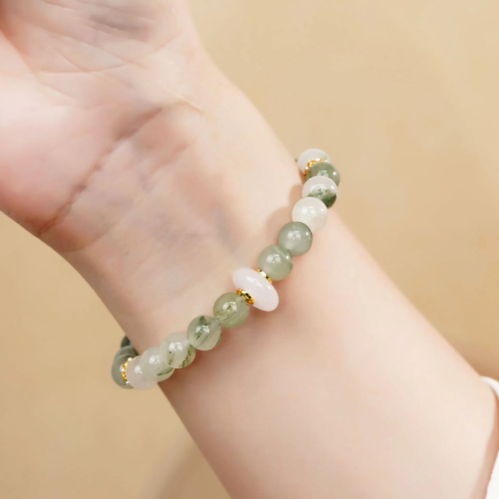 Emerald green Tian Shan jadeite half bracelet with floating flower girl design and round elements