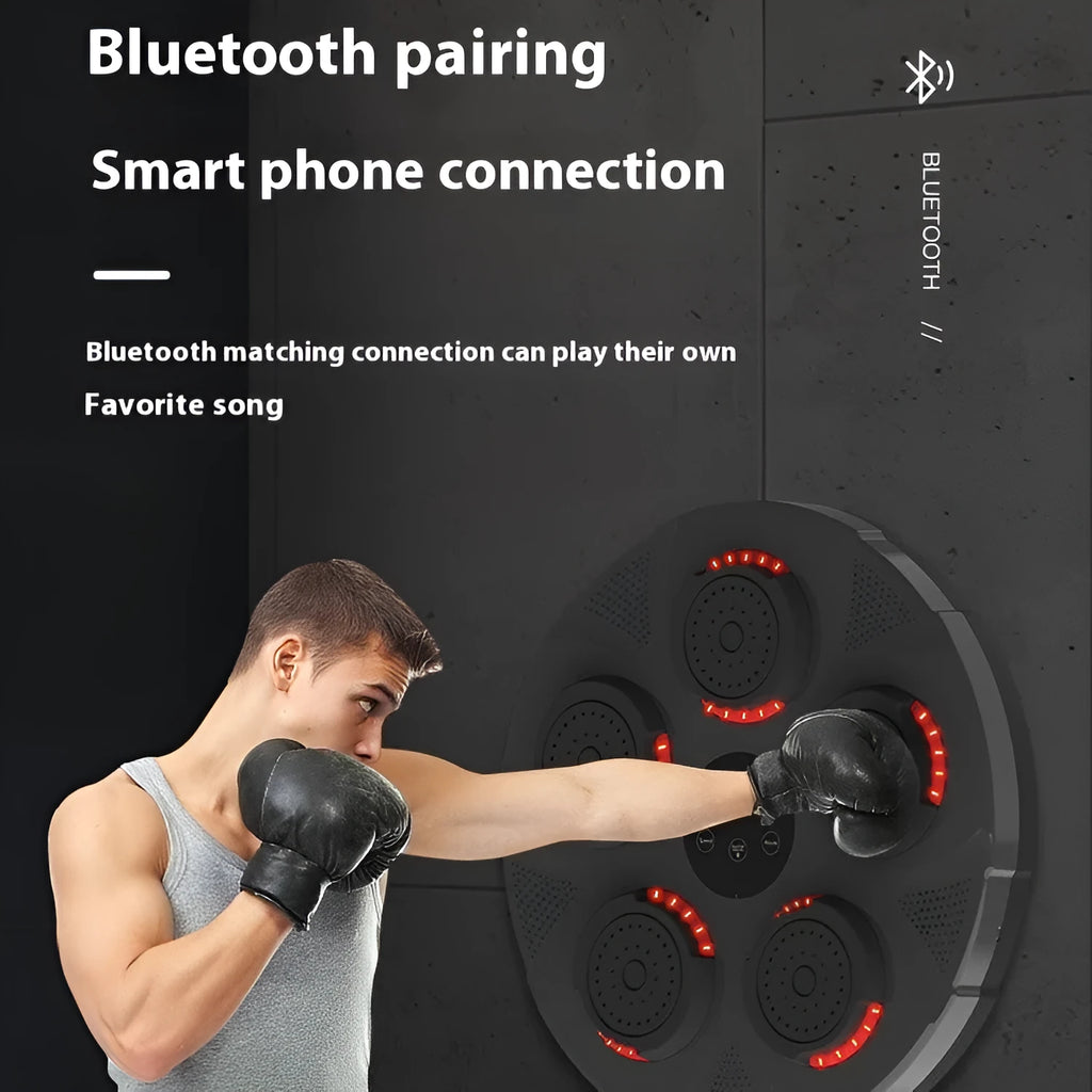 Black wall-mounted smart boxing trainer sandbag with striking target pads and integrated lighting.