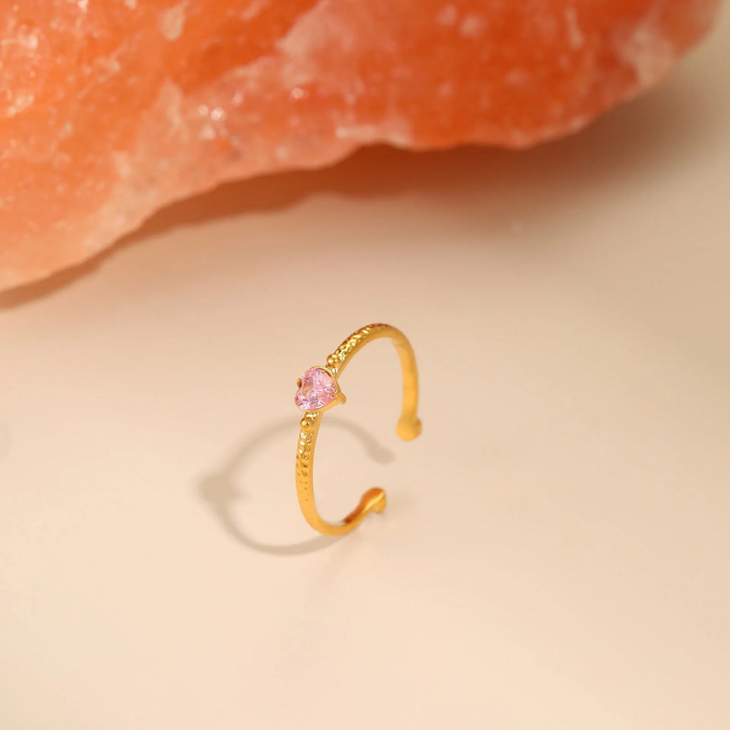 Open ended heart ring with zircon stones in stainless steel, showing adjustable free size design