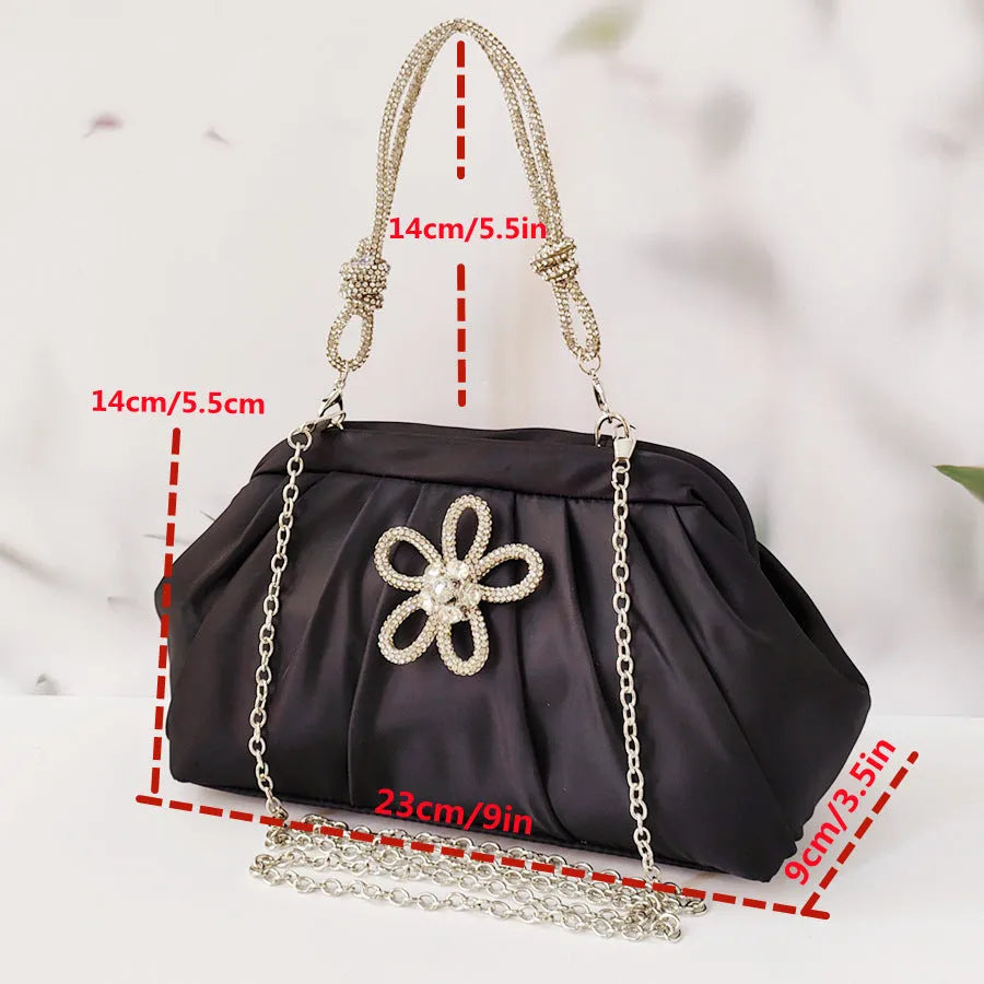 Women's black shoulder messenger bag with document compartment, soft polyester material, and chain decorative details