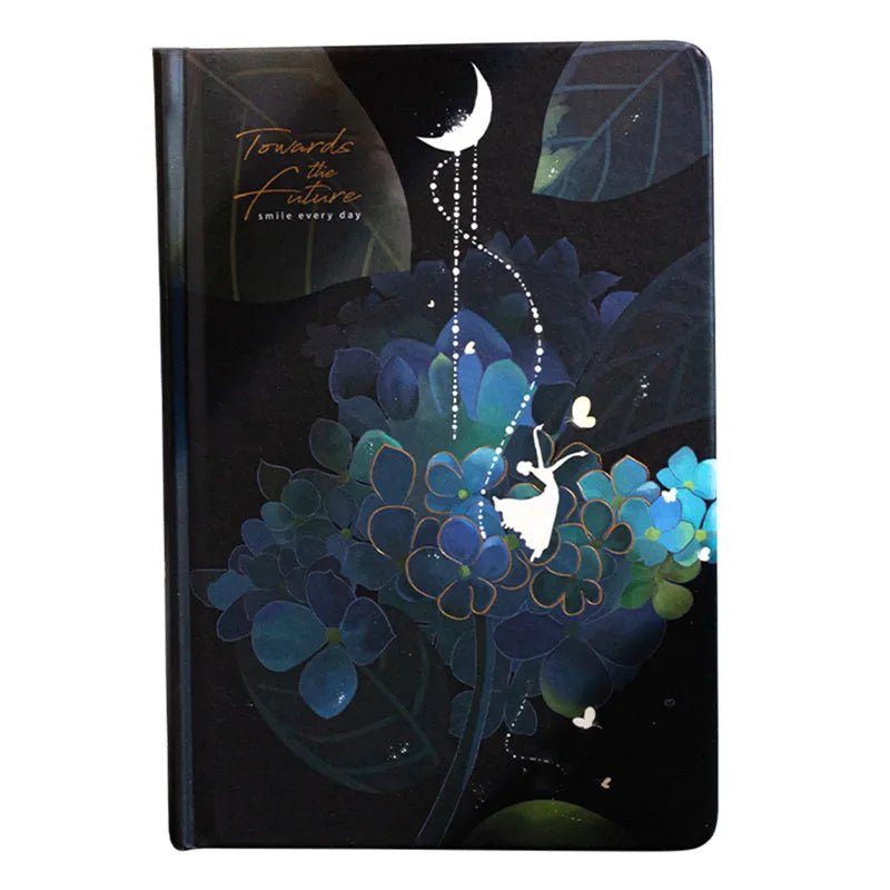 A5 notebook with luminous cover in Deep Blue, open to show colour illustration pages, size 21 x 14.8 cm
