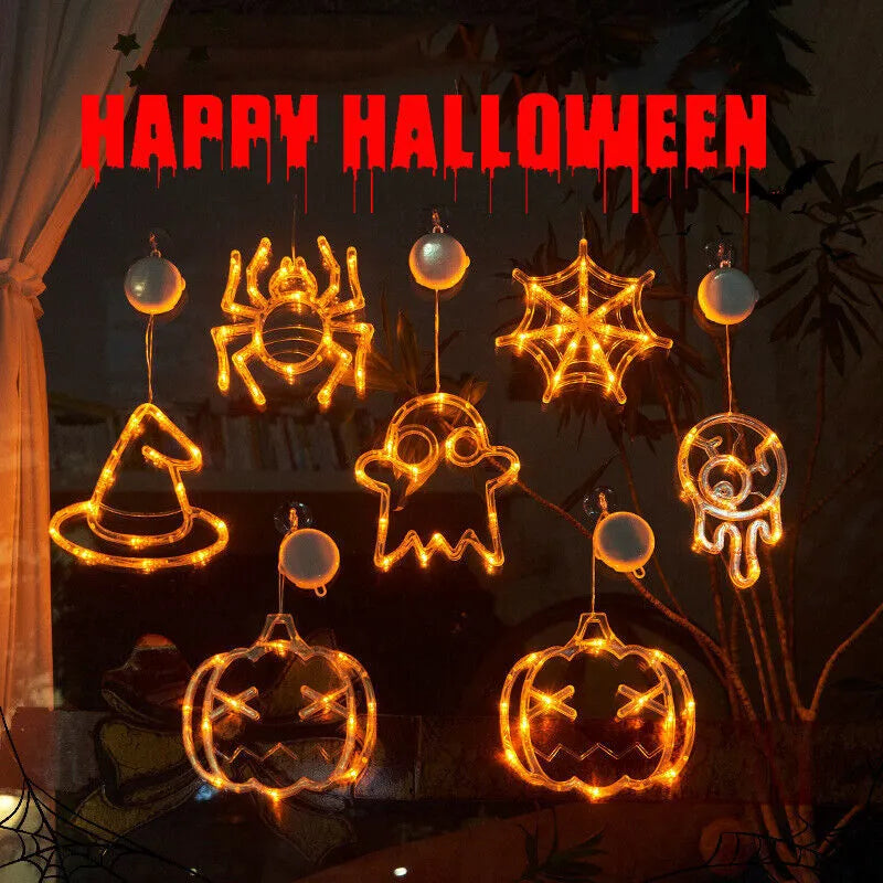 Halloween LED window lights set with spider, pumpkin and ghost designs on suction cups