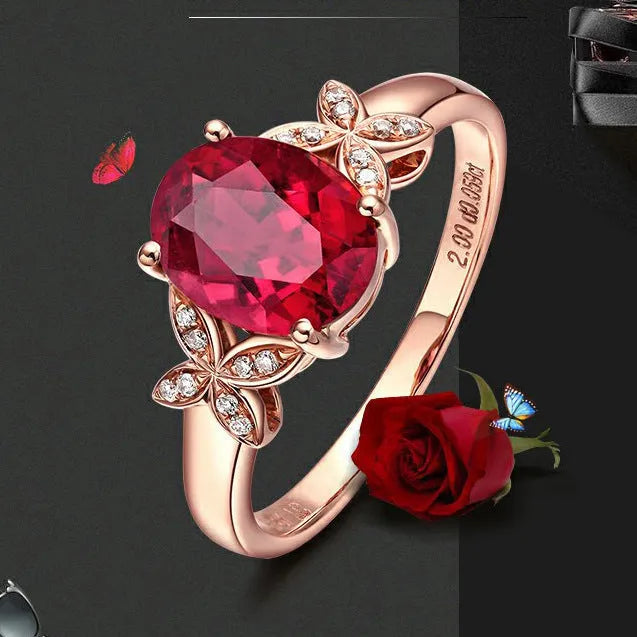 Women's 18k rose gold plated copper butterfly ring in a heart shape, shown in red and blue colour options.