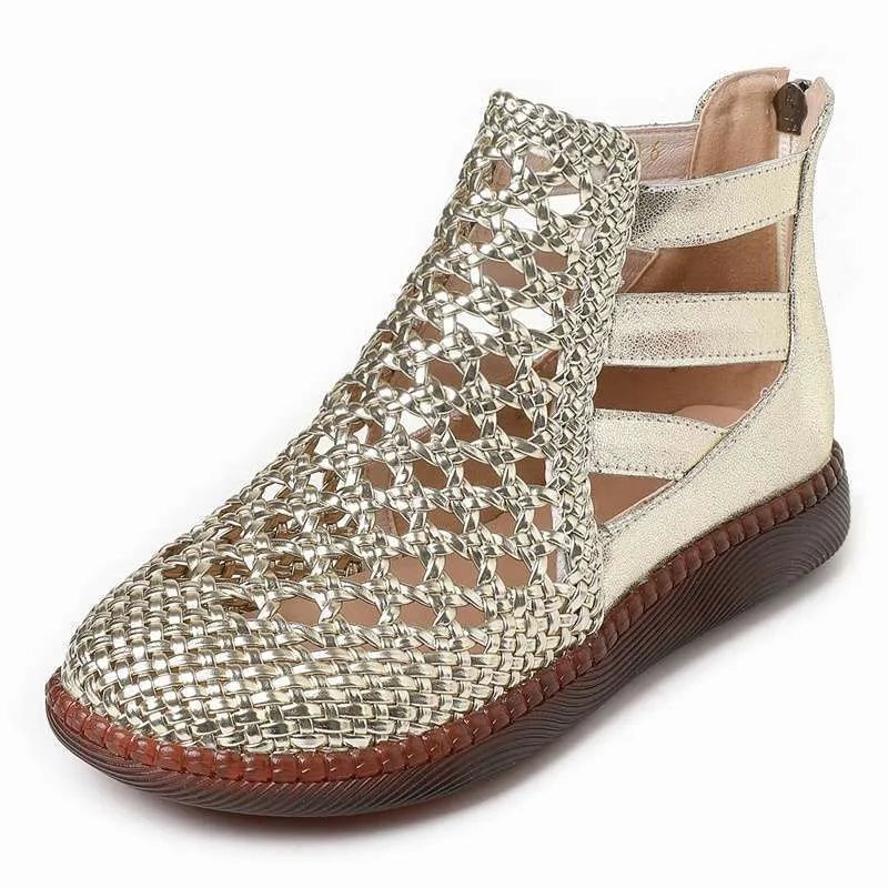 Women's flat sandals with hollow-out design in gold colour showing soft TPR soles and oversleeve style