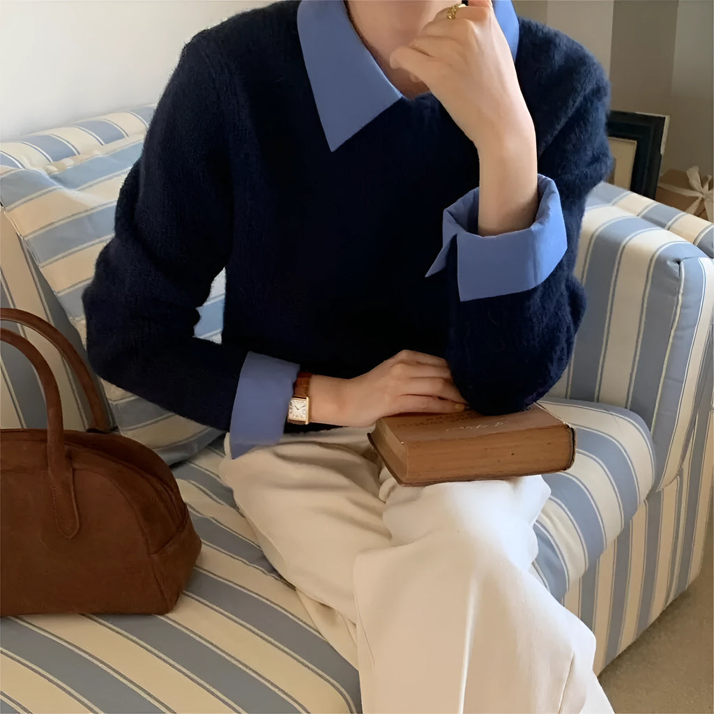 Women's knitwear top with contrast lapels in polyester, showing loose fit and long sleeves