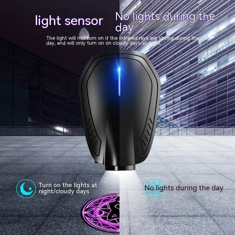 Black F2 rechargeable wireless car welcome light projector with ABS plastic housing.