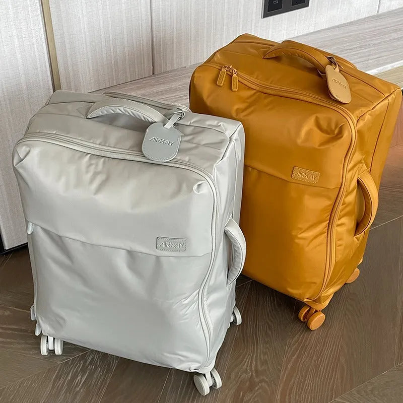 Ultra-light waterproof Oxford cloth suitcase in bluestone green with universal wheels and antimicrobial lining