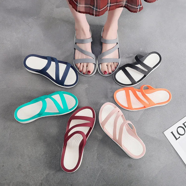 Women's solid colour casual sandals with a breathable PP upper, shown in red.