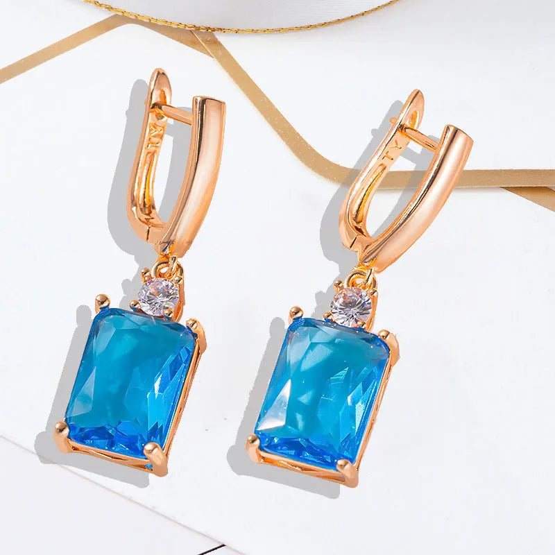 Pair of square geometric earrings with quadrilateral design in gold or silver electroplated finish on copper