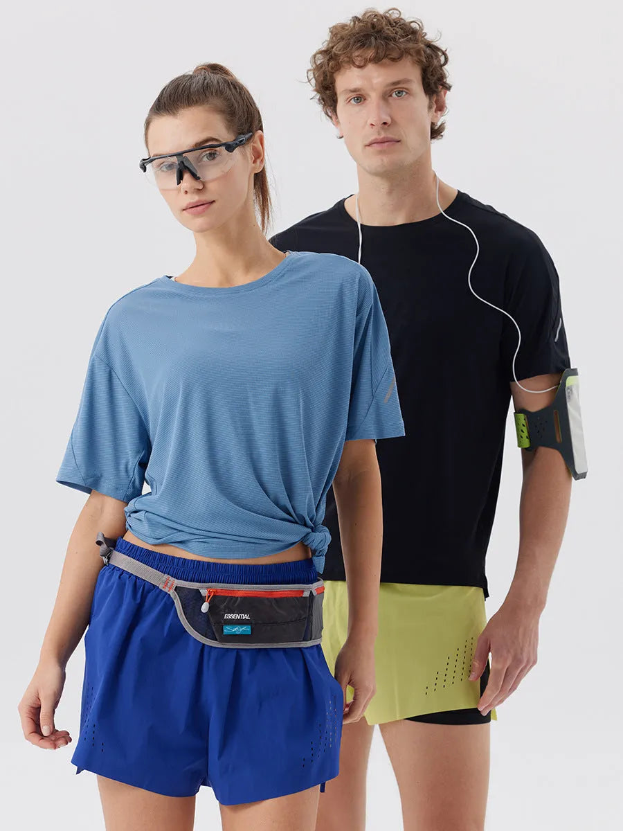 Men's straight-cut nylon sports shorts with side slits, shown in turmeric yellow, for summer athletic wear.