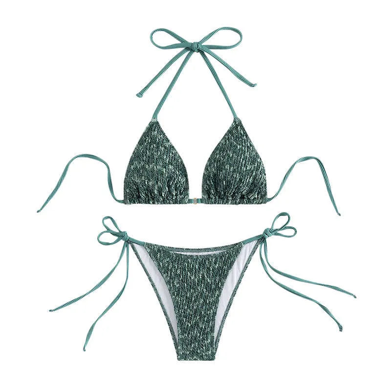 Green women's halter backless swimsuit set with matching shorts