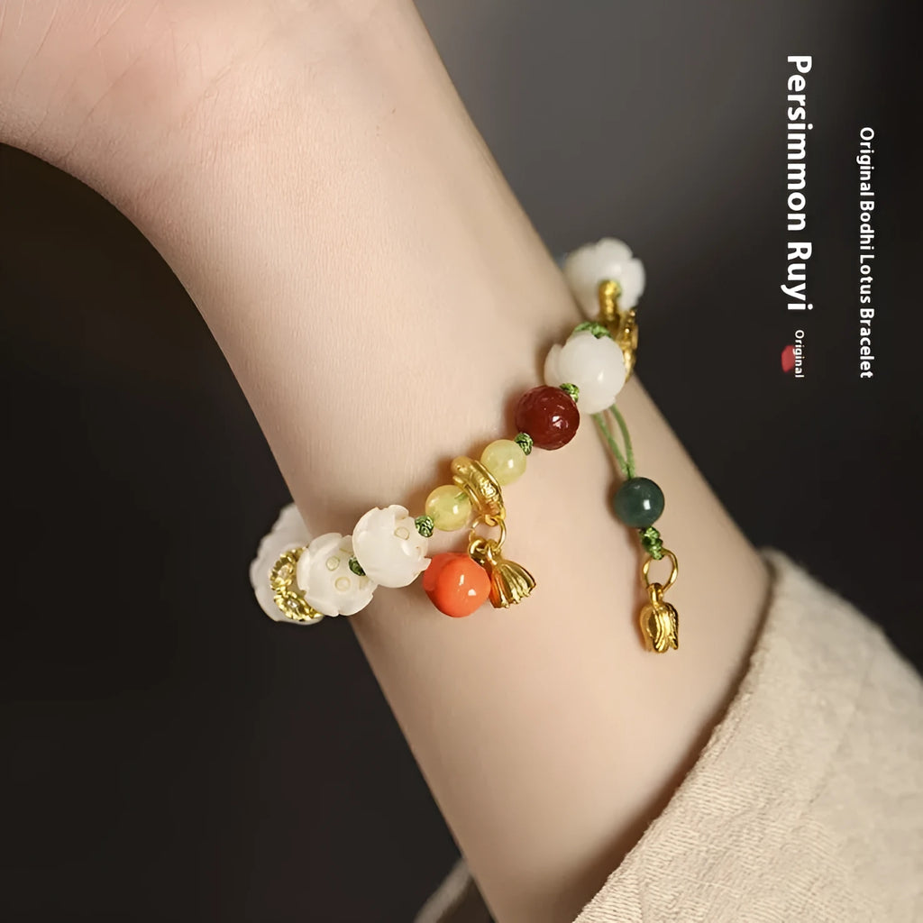 Hand-woven white jade Bodhi bracelet with lucky persimmon charm and three bead sizes on open rope