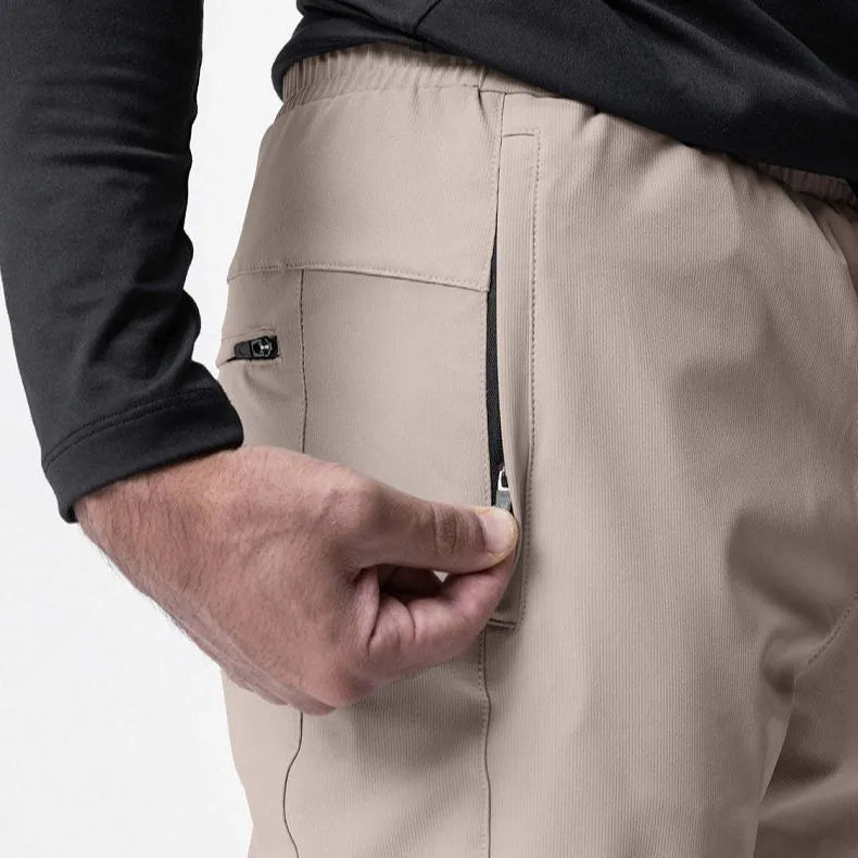 Men's grey fitness trousers with ankle-tied design, quick-drying polyester fabric for exercise