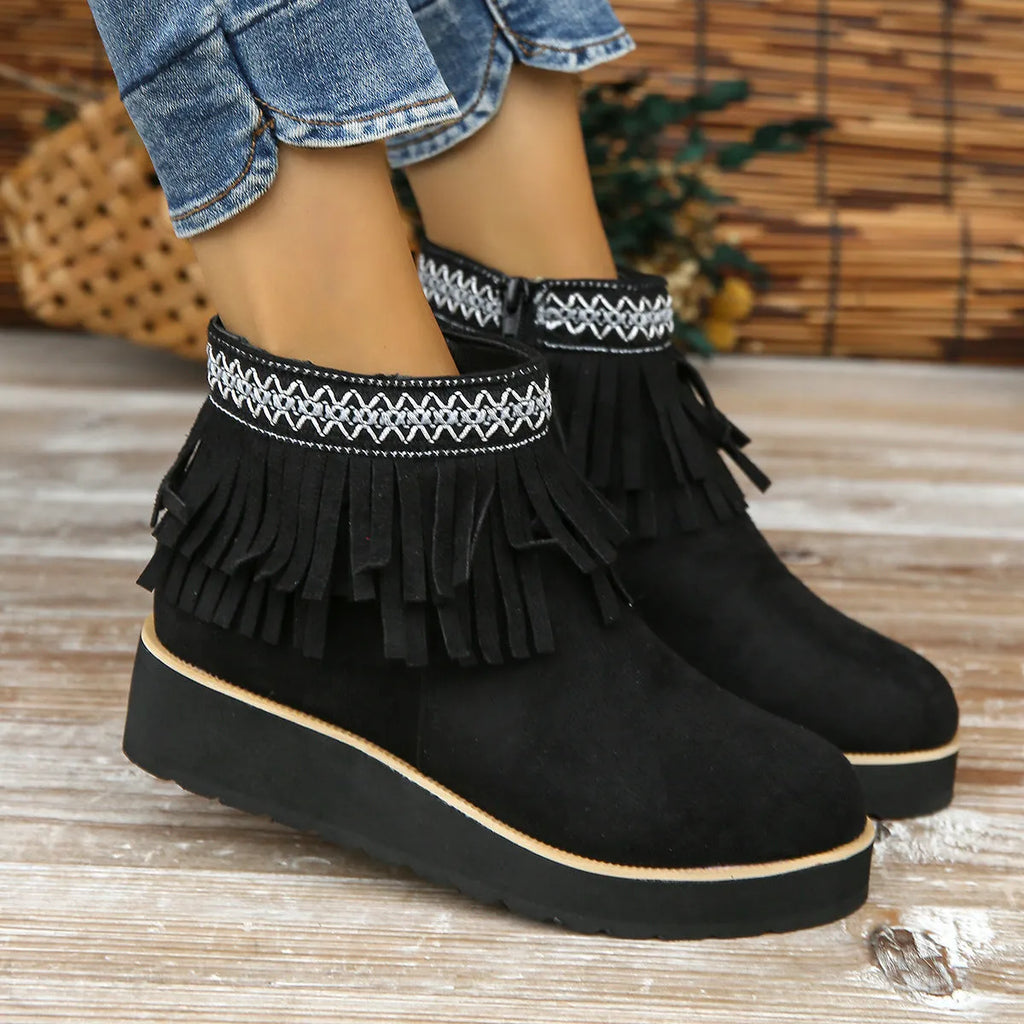 Women's suede wedge bootie in dark brown with side zipper and tassel detail on a 4cm rubber sole