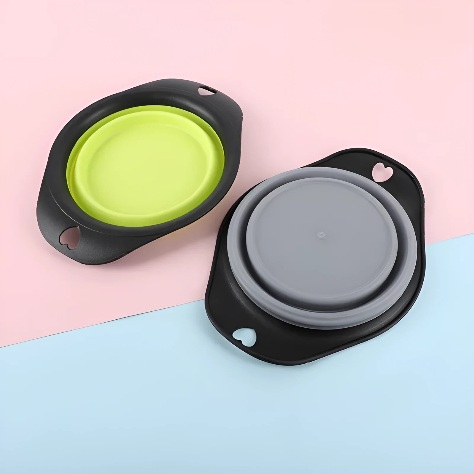 Black and green silicone pet bowls shown folded flat and unfolded ready for use.