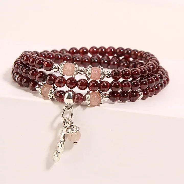 Wine red garnet crystal bracelet with floral design and bohemian style for women