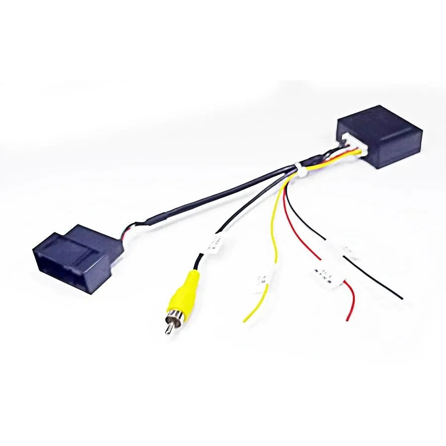 Black original car camera conversion box for Volkswagen and Skoda MIB hosts.