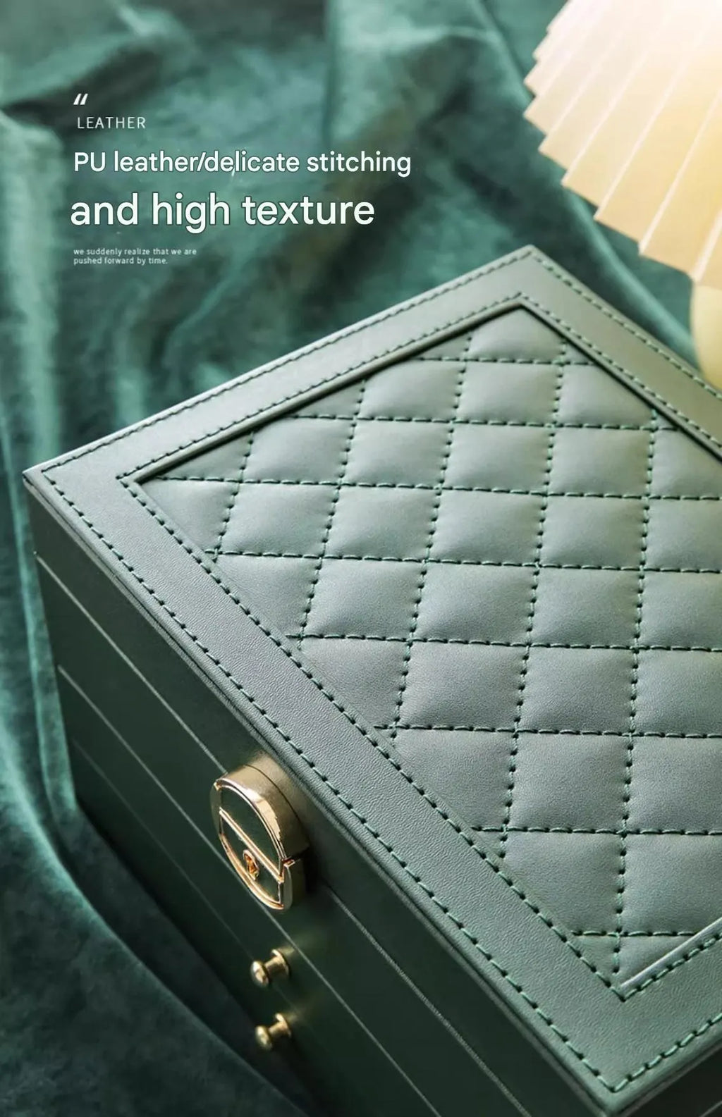 Leather jewellery storage box with three drawers open, showing storage for necklaces, earrings, and bracelets.