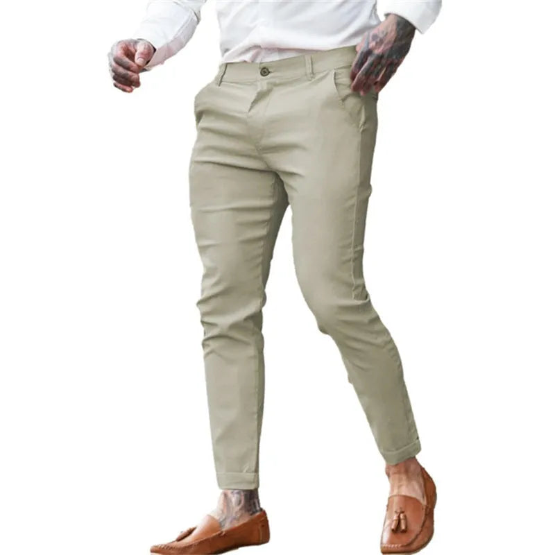 Men's slim fit pencil trousers in stretch cotton twill fabric, shown in a solid colour with a zip fly and mid-waist design.
