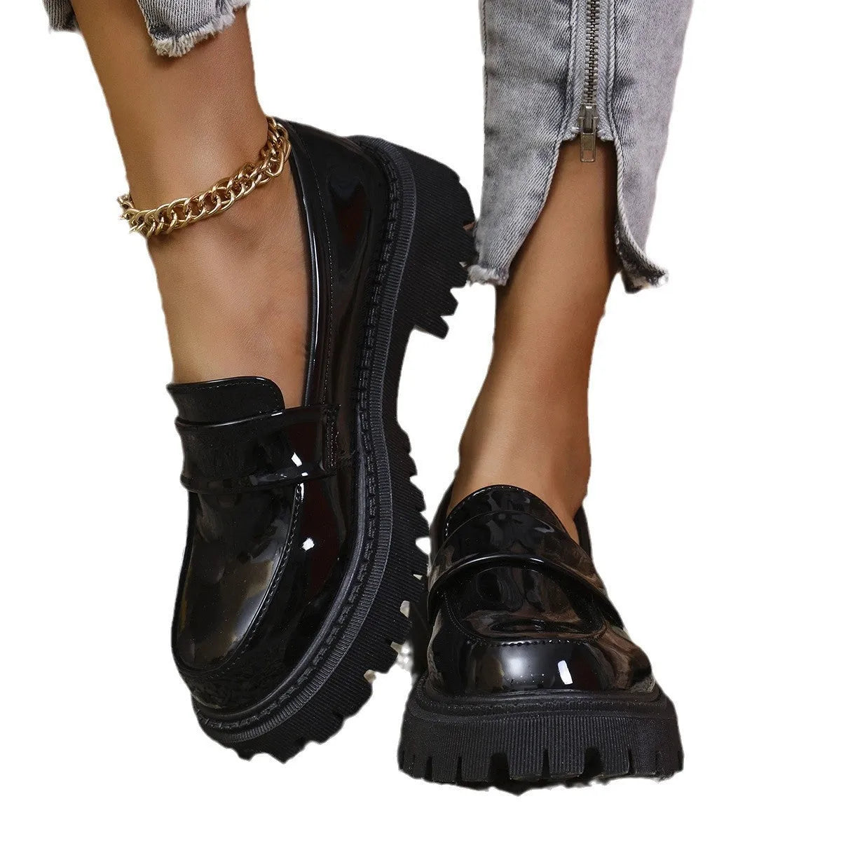 Plus size slip-on loafers with chunky heel in black, green, and wine red colours on a solid background