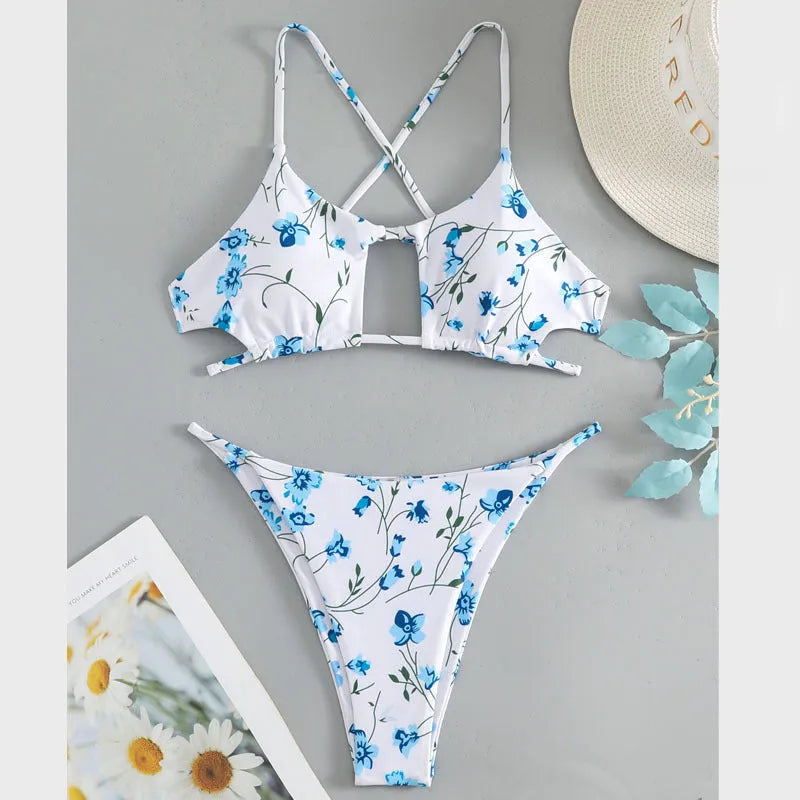 Women's floral patterned tie-neck triangle bikini top with matching shorts swimwear set